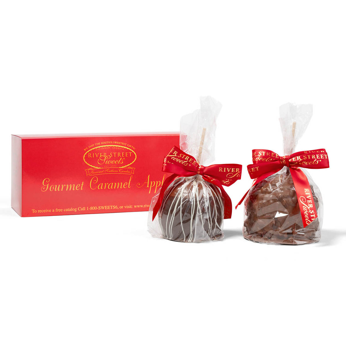 Two River Street Treats caramel apple packages with a red box in the background.