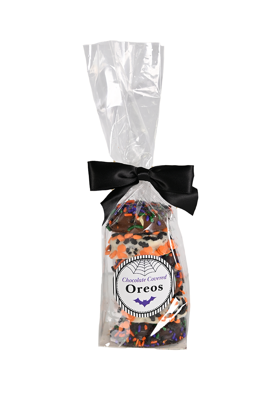 Chocolate covered oreos with Halloween themed sprinkes in a clear bag with a black bow