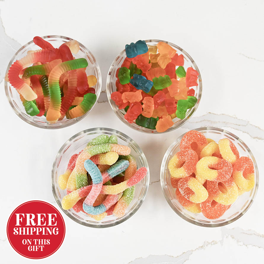 Four glass bowls filled with colorful gummy candies on a white background, with a free shipping label.
