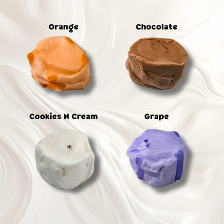 A white background with four pieces of taffy