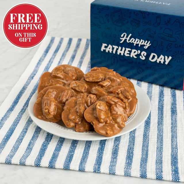 Plate of pralines with a Father's Day gift box on a striped cloth