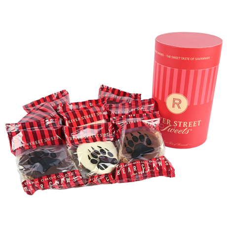 Wrapped assorted bear claws beside a red "River Street Sweets" canister