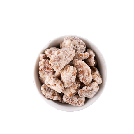 Cinnamon pecans in a white bowl
