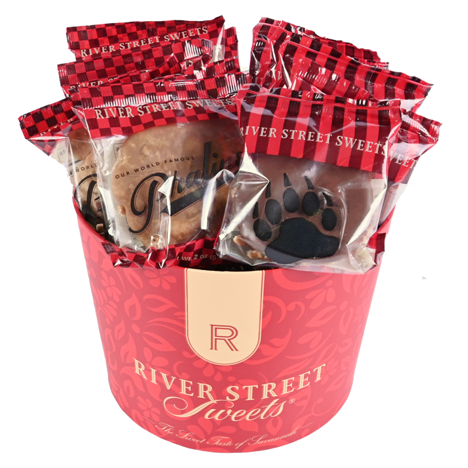 Wrapped pralines and bear claws in a red "River Street Sweets" tub
