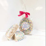 Easter egg-shaped Krispy with a pink bow and 'Easter Egg Krispy' label on a white background.
