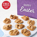 Pralines on a white plate with a purple 'Happy Easter' box in the background.