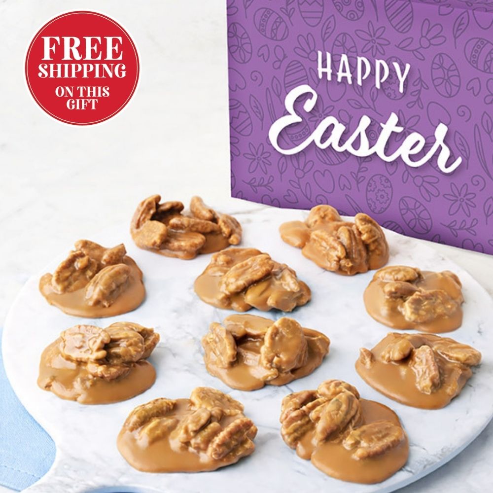 Pralines on a white plate with a purple 'Happy Easter' box in the background.