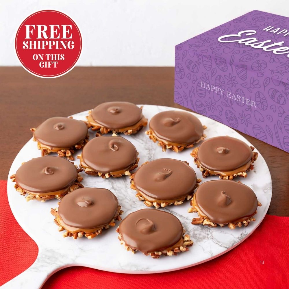 Chocolate bear claws on a plate with a 'Happy Easter' box in the background.