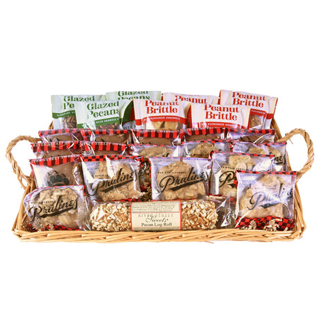 Wicker basket with handles stuffed with packaged candies