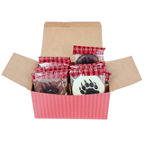 Red striped box with assorted wrapped bear claws peeking out