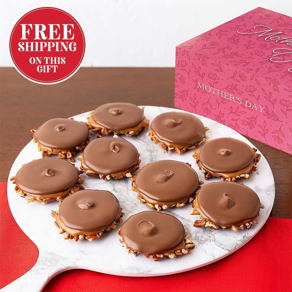 Bear claws on a plate with a pink 'Mother's Day' box in the background.