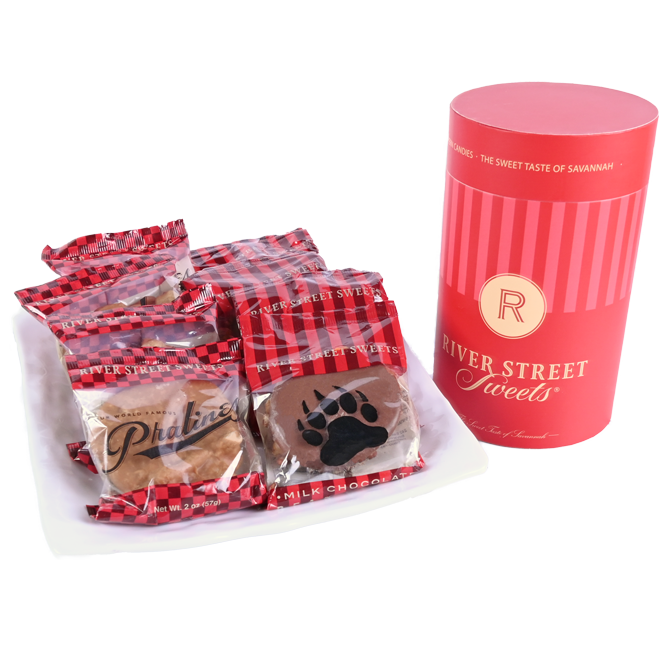 Packaged Pralines and Bear Claws beside a red "River Street Sweets" canister