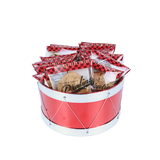 Red drum-shaped basket filled with wrapped pralines