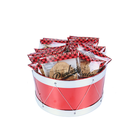 Red drum-shaped basket filled with wrapped pralines