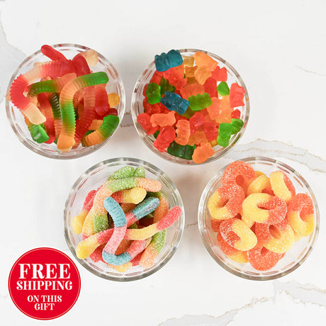 Four glass bowls filled with colorful gummy candies on a white background, with a free shipping label.