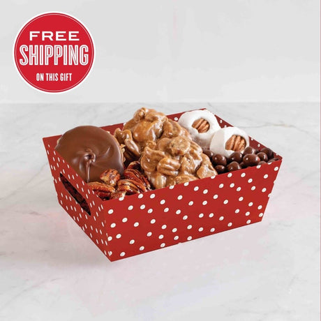 Red polka dot box filled with assorted candies on a white background with free shipping text.