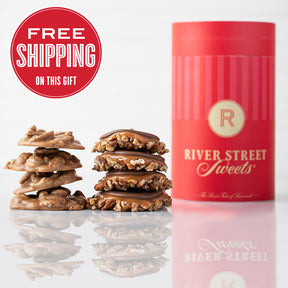 A red cylindrical canister labeled 'River Street Sweets' with a stack of praline and bear claw in front of it, and a 'Free Shipping' text overlay at the top.