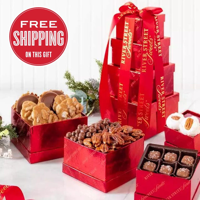 A gift tower of various chocolate candies and nuts in red and gold packaging, with a 'Free Shipping on this gift' label.