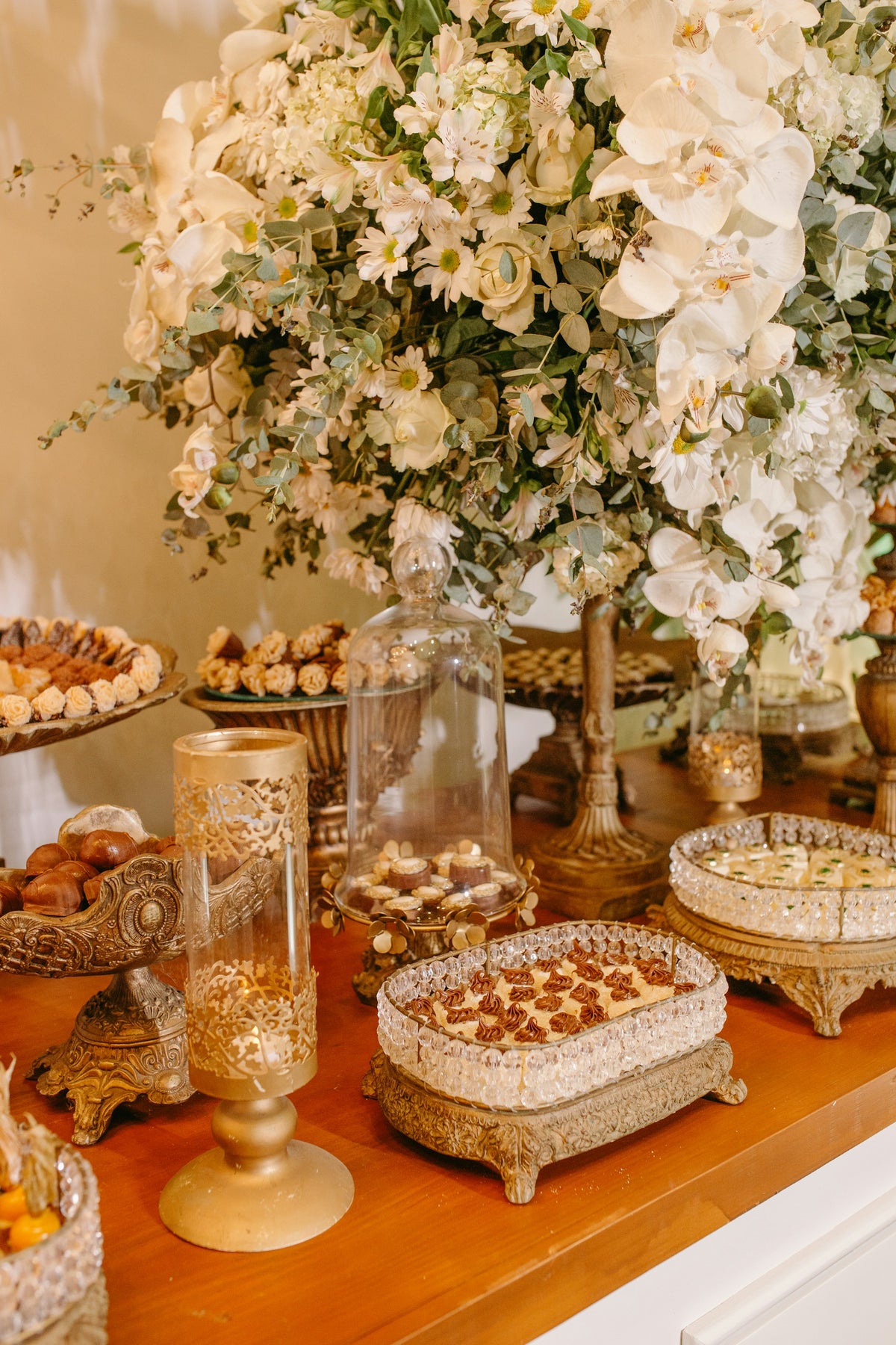 Wedding dessert table with flowers