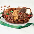Basket of assorted chocolates with a green ribbon on a white background