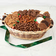 Wicker basket filled with assorted chocolates and candies, branded 'River Street Sweets', on a white background.