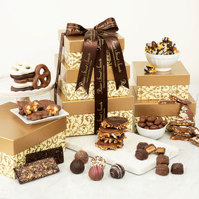 Assorted chocolates and gift boxes with decorative ribbons on a white background