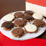 Assorted bear claws on a marble plate with a red box in the background.
