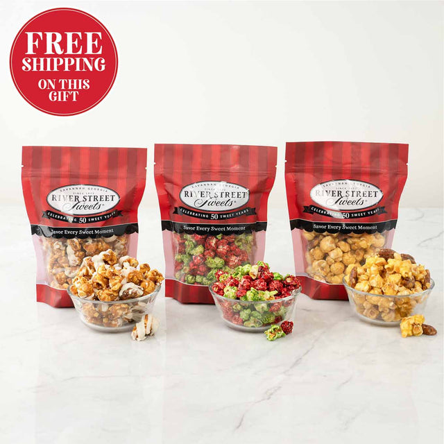 Three bags of River Street Treats with bowls of popcorn a on a white background, featuring free shipping text.
